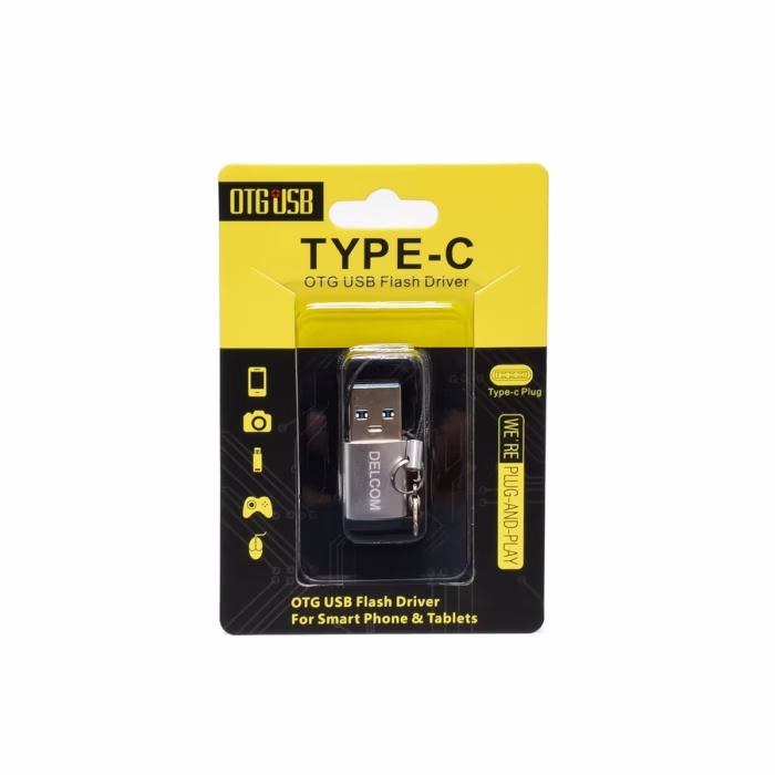 Adaptador USB C Hembra a USB A  Macho Delcom Conecta tus Cables USB C en Cualquier Puerto USB Pequeño adaptador Delcom DOTG USB de color plateado mostrando el conector USB A macho y el puerto USB C hembra con su cordón de seguridad de nylon producto de HD Multimedia