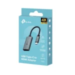 Adaptador USB-C a HDMI 4K@60Hz TP-Link UA520C: ¡Calidad de Imagen Superior y Confiabilidad!, Adaptador USB-C a HDMI TP-Link UA520C de color gris con carcasa de aluminio y cable enmallado negro, mostrando el conector USB-C y el puerto HDMI hembra, producto premium de HD Multimedia.