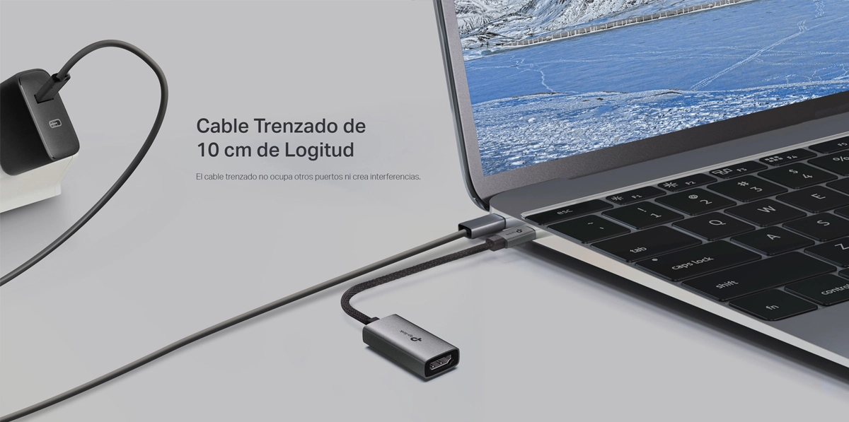 Adaptador USB-C a HDMI 4K@60Hz TP-Link UA520C: ¡Calidad de Imagen Superior y Confiabilidad!, Adaptador USB-C a HDMI TP-Link UA520C de color gris con carcasa de aluminio y cable enmallado negro, mostrando el conector USB-C y el puerto HDMI hembra, producto premium de HD Multimedia.