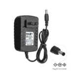 Adaptador de Voltaje 5V 3A Briyon RU-5003: ¡Potencia Estable para tus Dispositivos!, Adaptador de corriente Briyon RU-5003 de 5V 3A color negro, con su enchufe plano directo a la pared y cable con conector DC, producto de HD Multimedia.