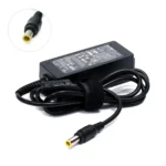 Cargador para Monitor LG 19V 1.3A Briyon LG-19134: ¡El Reemplazo Perfecto!, Cargador de reemplazo Briyon LG-19134 para monitor LG, mostrando el transformador negro y el conector de salida específico de 6.5mm con su pin central, producto de HD Multimedia.
