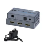 Splitter HDMI 1x2 4K@60Hz con Extractor de Audio NETCOM PE-EL0319: ¡Duplica y Extrae!, Splitter HDMI 1x2 con extractor de audio NETCOM PE-EL0319 de metal negro, mostrando su puerto de entrada HDMI y sus salidas HDMI, óptica y 3.5mm, producto de HD Multimedia.
