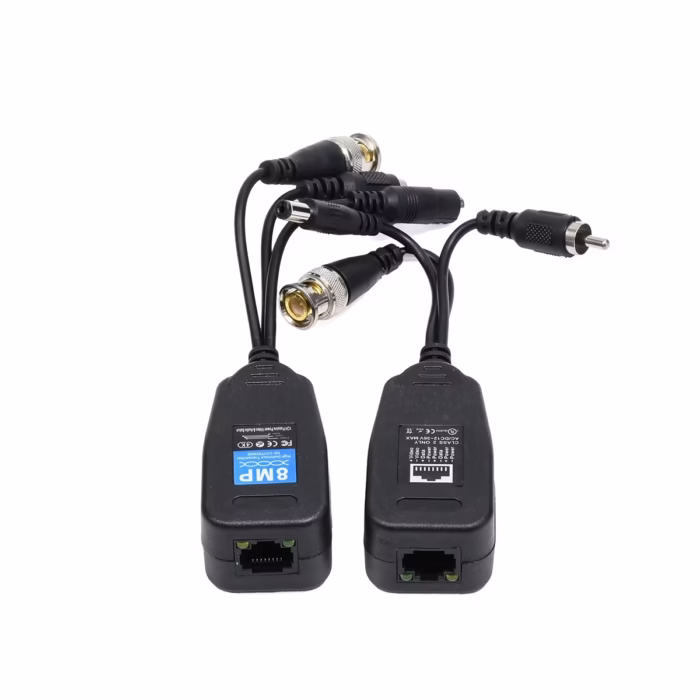 Video Balun RJ MP  en  Video Poder y Audio American NET GP  DC  Simplifica tu Instalación Par de video baluns  en  American NET GP  DC  mostrando los conectores BNC de video DC de poder y RCA de audio en un extremo y el puerto de red RJ en el otro producto de HD Multimedia