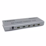 Splitter HDMI 1x4 8K 60Hz / 4K@120Hz Version 2.1 NETCOM PE-SH0204: Lleva tu Señal 8K a 4 Pantallas a la Vez, Divisor HDMI 8K 1x4, Splitter HDMI 1x4 profesional Netcom PE-SH0204 de metal color gris, mostrando su único puerto de entrada y sus cuatro puertos de salida para video 8K, producto de HD Multimedia PERU SAC.