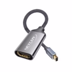 Adaptador Mini DisplayPort a HDMI 4K@30Hz NETCOM PE-VA0379: Conecta tu MacBook, Surface o Laptop a lo Grande, Adaptador premium Mini DisplayPort a HDMI Netcom PE-VA0379, mostrando el cable corto enmallado, el conector Mini DP macho de aluminio y el puerto HDMI hembra, producto de HD Multimedia PERU SAC.