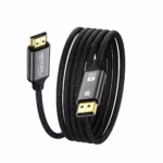 Cable DisplayPort a HDMI 4K de 3MT Enmallado NETCOM PE-DH0103: Conecta tu PC a tu TV sin Límites, Cable premium DisplayPort a HDMI Netcom PE-DH0103 de 3 metros, enmallado en nylon, mostrando sus conectores de aleación de aluminio y contactos dorados, producto de HD Multimedia PERU SAC.