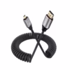 Cable Micro HDMI en Espiral de MT KHz KHz NETCOM PE HD La Conexión Flexible y Sin Enredos para tu Cámara o GoPro Cable Micro HDMI a HDMI en espiral Netcom PE HD de color negro mostrando su diseño helicoidal y sus conectores premium de aluminio y dorados un producto de HD Multimedia PERU SAC