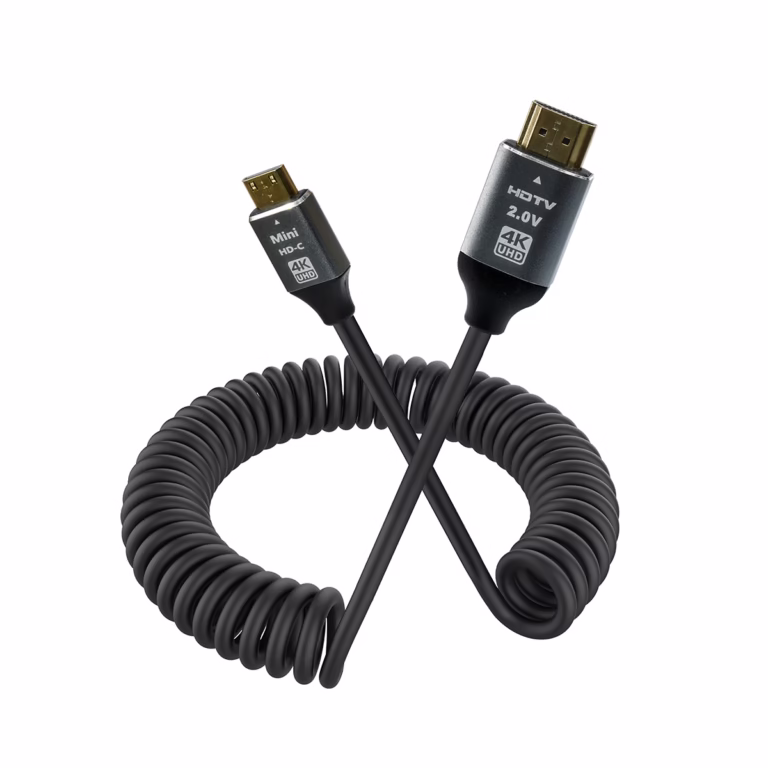 Cable Mini HDMI en Espiral de 1.5MT 4k@60Hz 2K@165Hz NETCOM PE-HD0840: La Conexión Perfecta y sin Enredos para tu Cámara, Cable Mini HDMI a HDMI en espiral Netcom PE-HD0840 de color negro, mostrando su diseño helicoidal y sus conectores premium de aluminio y dorados, un producto de HD Multimedia PERU SAC.