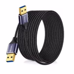 Cable USB-A de 8 Metros USB 3.0 Macho a Macho NETCOM PE-AM0308: Máximo Alcance para tus Dispositivos, Cable USB 3.0 premium de 8 metros Netcom PE-AM0308, mostrando sus dos conectores macho USB-A con cabezales de aleación de aluminio, un producto de HD Multimedia PERU SAC.