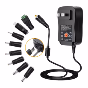 Adaptador Multi Voltaje Regulado Delcom DL-AUC001 3v-12v Universal 30W | Con 8 Puntas DC y Salida USB, Distribuído en HD Multimedia PERU SAC