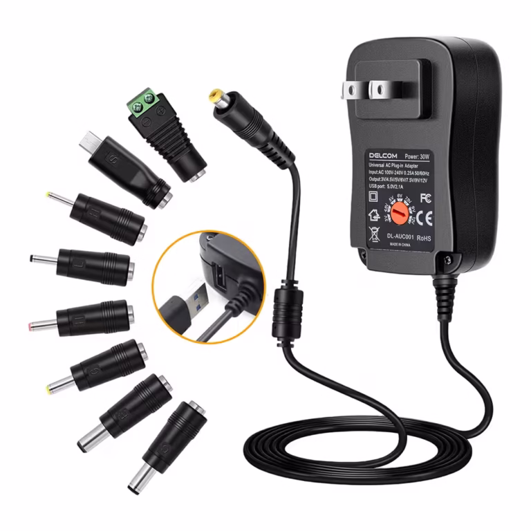 Adaptador Multi Voltaje Regulado Delcom DL-AUC001 3v-12v Universal 30W | Con 8 Puntas DC y Salida USB, Distribuído en HD Multimedia PERU SAC